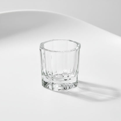 Close-up, isolated shot of the small, glass mixing dish used to blend the G2 Fuse Activator Gel and the True Tone Pigment together.