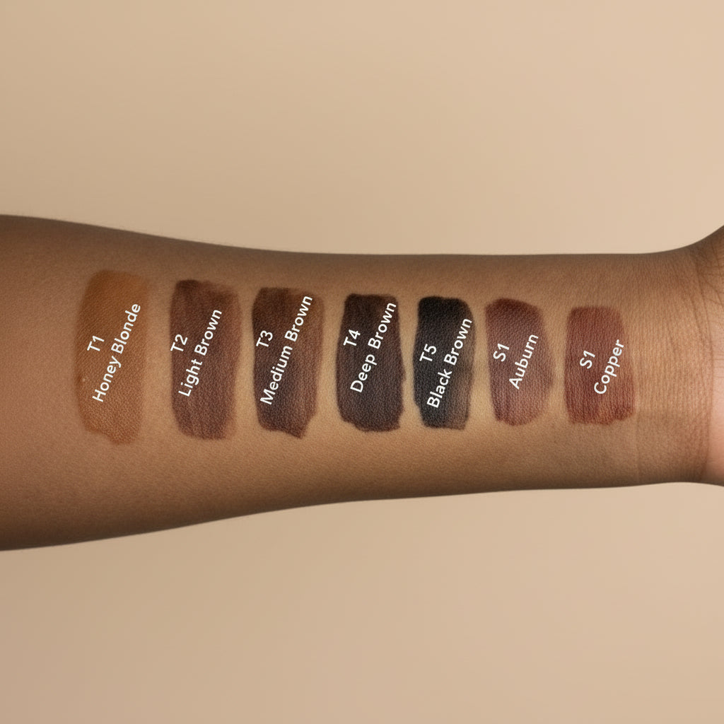 TINTOLOGY True-Tone Pigment swatches on a deep skin tone, showing eight shades from Honey Blonde to Copper.